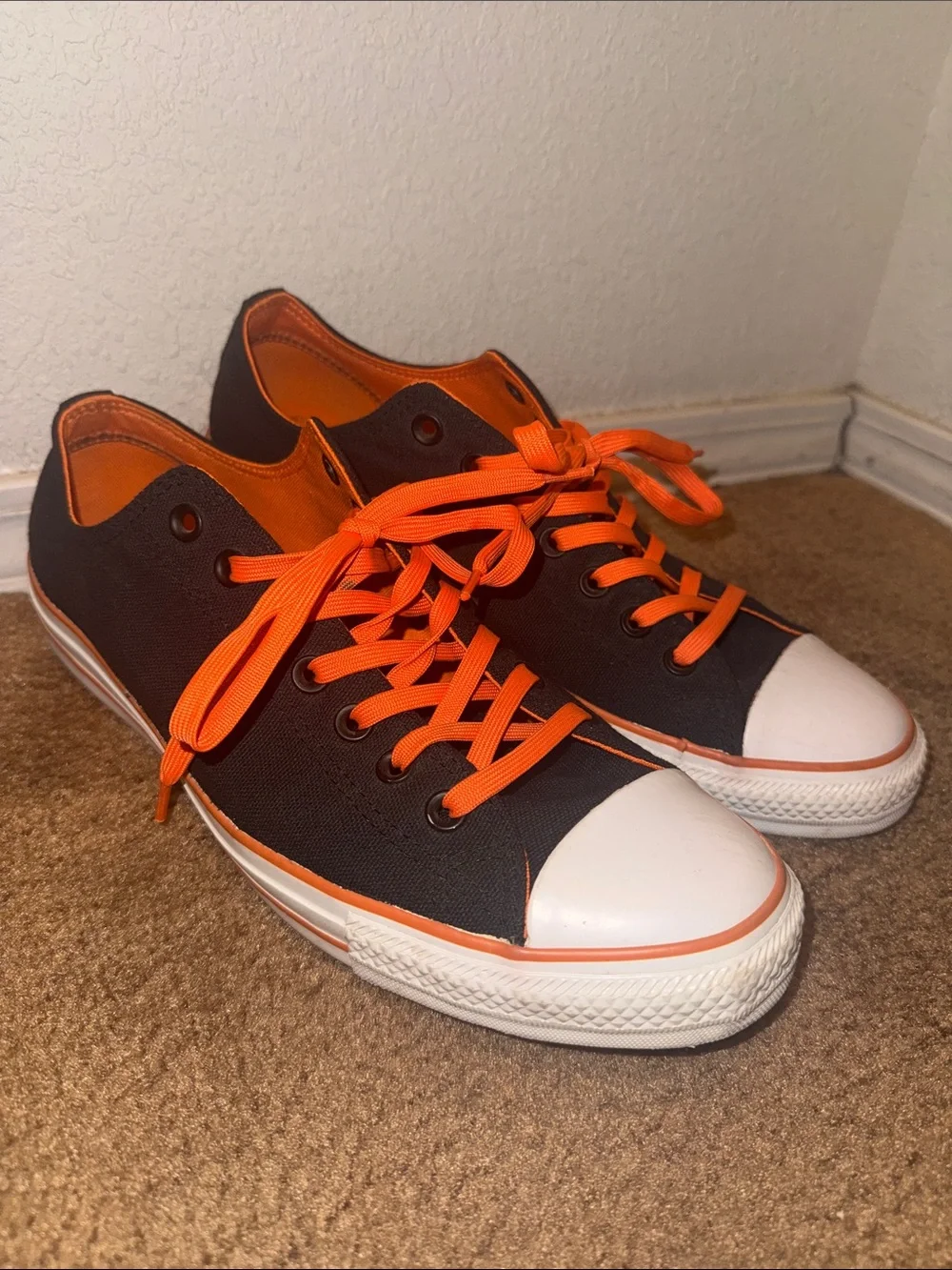 Converse Black Canvas Low-Top Sneakers with Bright Orange Laces